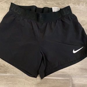 Black womens nike shorts with short spandex inside